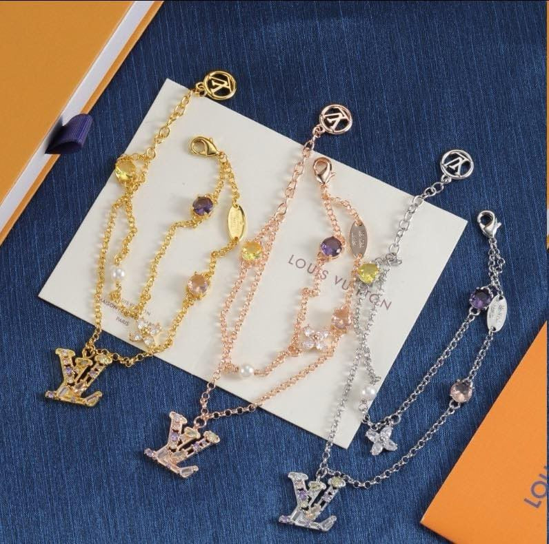 L. V. Layered Charm Necklace