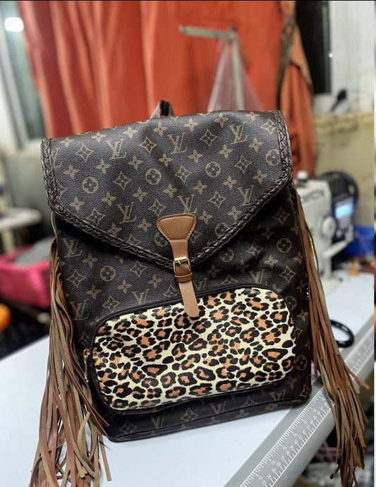L. V. Fringe Leopard Backpack